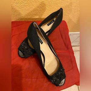 Beautiful black Alex Marie open toe 3inch heel with design on top.